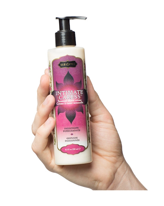Kama Sutra Intimate Caress Shave Cream product image with hand holding bottle